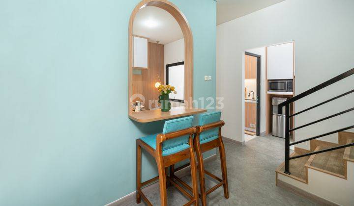 ruang keluarga rumah fully furnished siap huni
