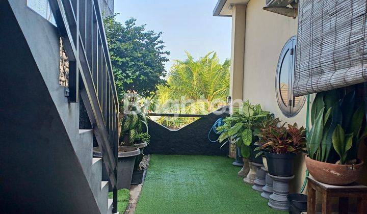 The 2-storey house has paved access roads and is wide, in good condition and well maintained, fully furnished with a rice field view 2