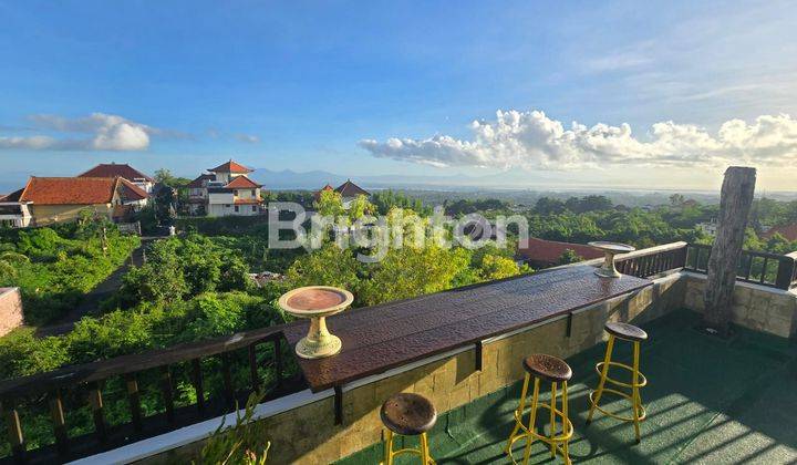 Fully furnished villa with spectacular view, there is a garden, gazebo, rooftop and jacuzzi pool in the Ungasan Jimbaran area. 1