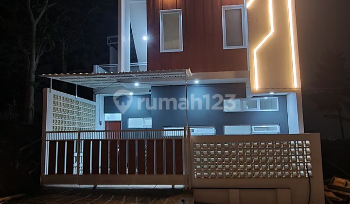 Rumah Asri Berkonsep Green Living di Komplek Firdaus Garden