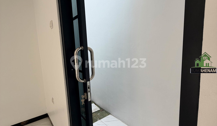 Rumah American Modern Siap Huni Dekat Tol Desari di Pccoran Mas
