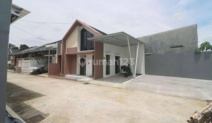 Rumah Cantik Posisi Hook Luas Tanah 116meter Cukup Booking 2JT,Langsung Akad All In Bonus Canopy,ac 2unit Dan Token Listrik 1