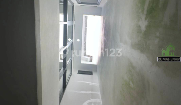 American Modern Concept House with 4 Bedrooms in Cinere 2