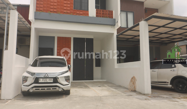 Minimalist 2-Story House on Krukut Main Road Near Tok Krukut