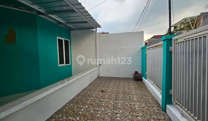 Rumah Lingkungan Nyaman di Puri Nirwana Estate Cibinong 2