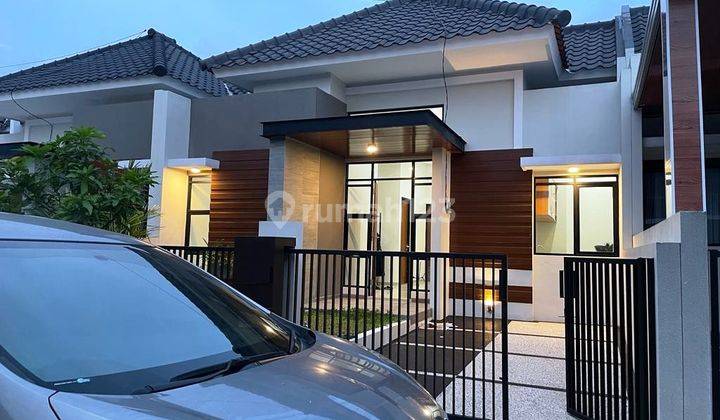 Rumah Minimalis Modern di Riverfront Urban Resort Malang 2