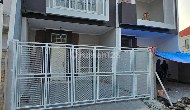 Rumah Murah 2 Lantai Model Scandinavian Di Lebak Indah Surabaya  1