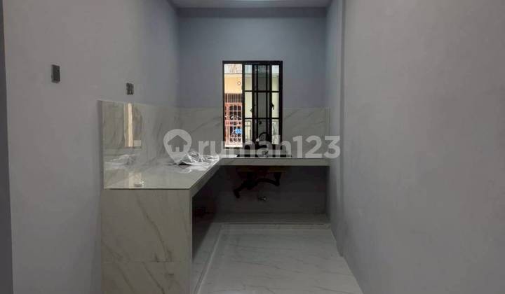 Di Jual Rumah 2 Lantai Plamo Garden 2
