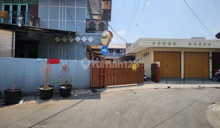 Rumah, kontrakan 18 pintu plus 3 kios di Pd Kelapa Jakarta Timur  1