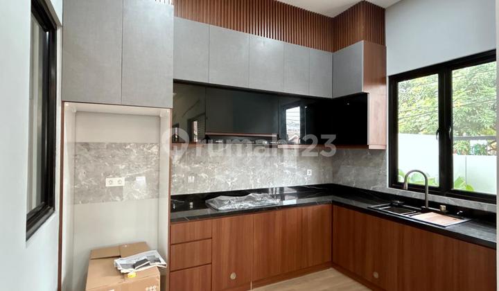 Modern Minimalist Hook House at Griya Loka BSD 2