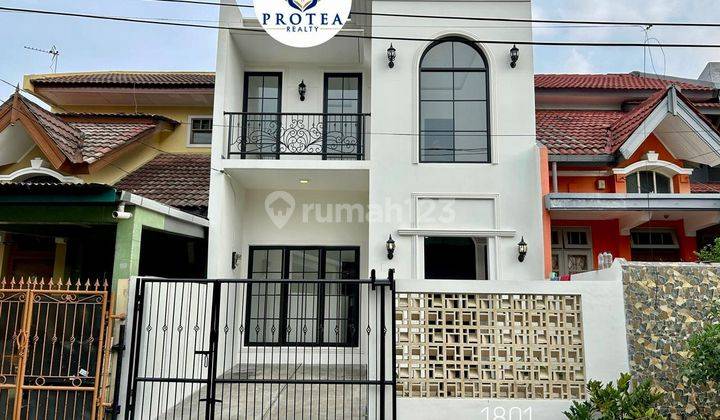 Rumah Tampilan Modern, Bagi Executive Muda di Griya Loka 1