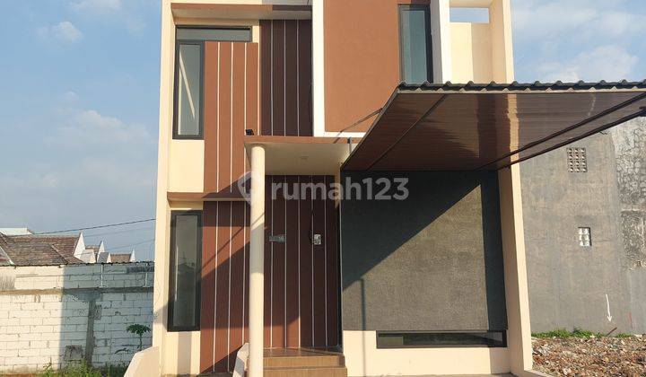 Rumah 2 lantai dgn 3 kamar tidur free biaya pajak