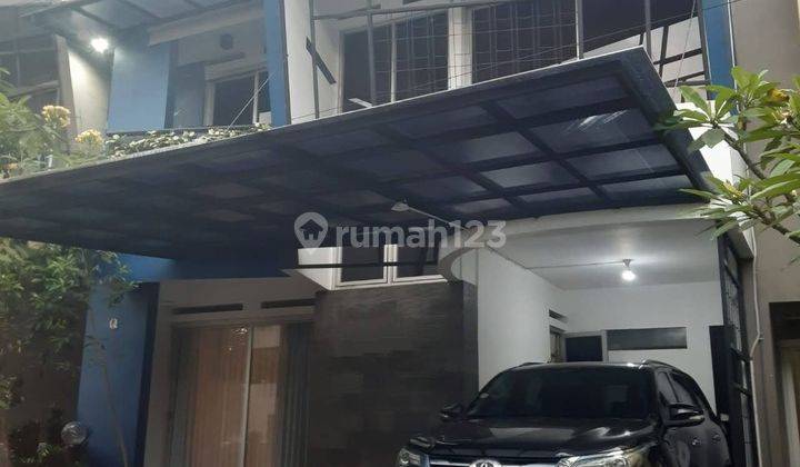 Di jual rumah dalam cluster di cigadung 1