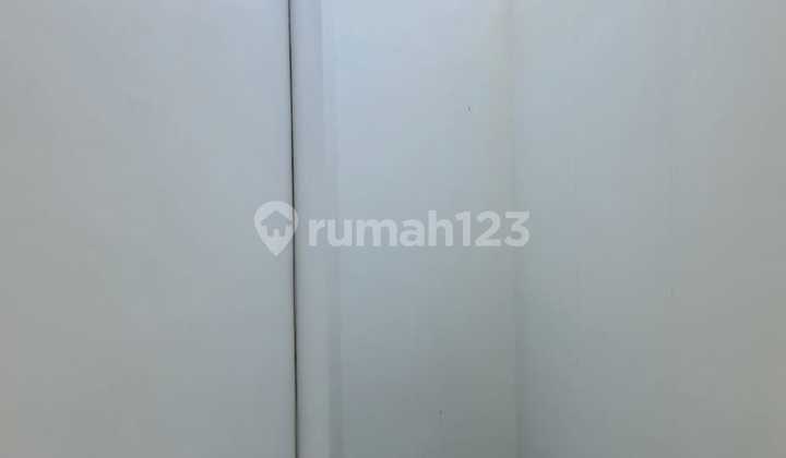 Strategic 2-Unit Shophouse in Jababeka Cikarang, Well-Maintained, Spacious Parking, Bustling Area. 2