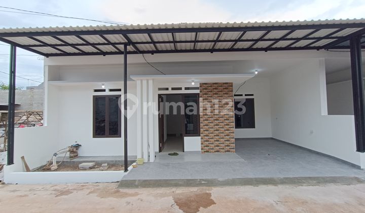 Rumah INDENT 800Jt-an di Jatibening Dalam Cluster Bebas Banjir