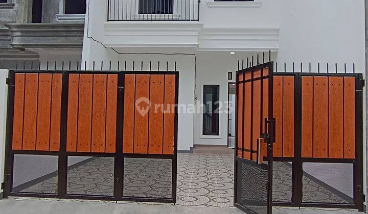 Rumah 2 Lantai SHM di Jatikramat Dalam Perumahan Bebas Banjir  1