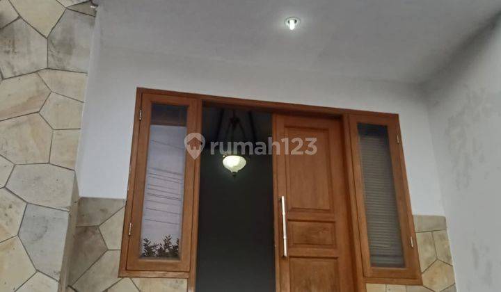 tampak depan rumah asri siap huni di