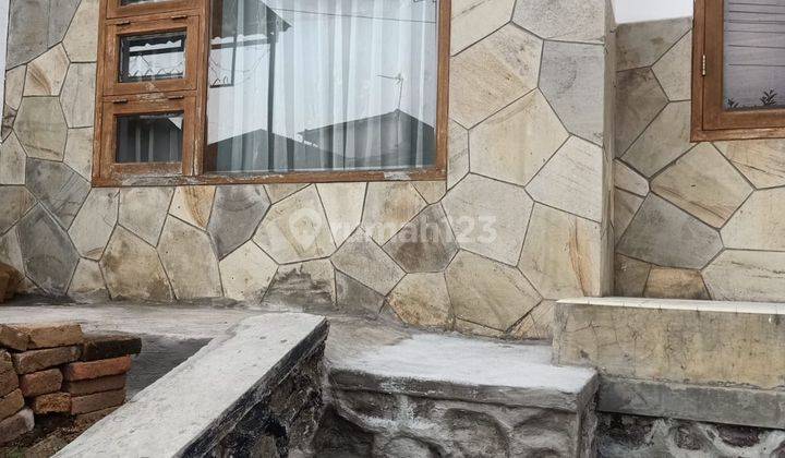 tampak depan rumah asri siap huni di