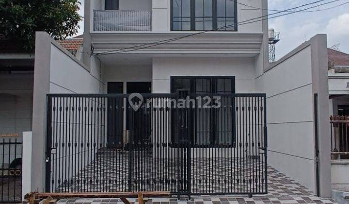 Rumah Baru American Style 2 Lantai Semi Furnished di Lokasi Premium Manyar Pusat Kota 1