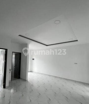 New 2-Story American Classic White Aesthetic House in Sutorejo, 3-Car Street Row. 2