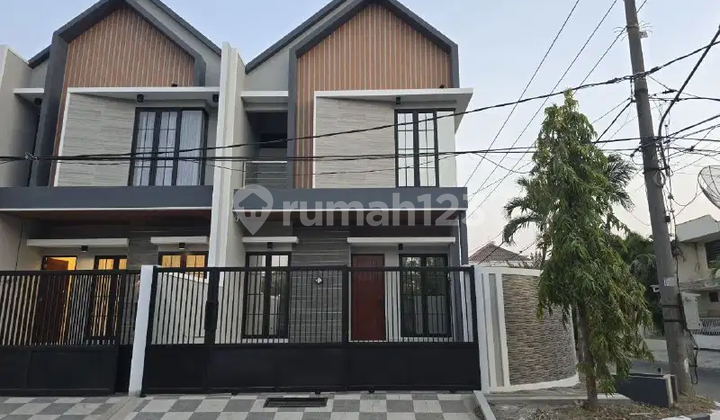 Rumah Baru Gress 2 lantai Scandinavian Luxury Lokasi Premium Sutorejo Prima depan Lap. Tennis
