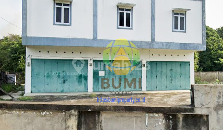 Shop house unit and extensive land of 1274 square meters in Sekayumusi. 1