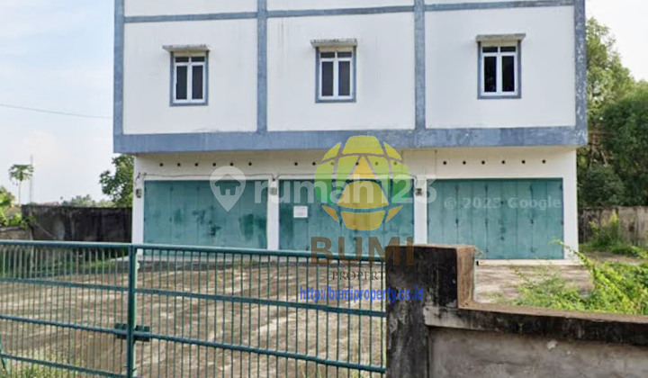 Shop house for sale and a large plot of land measuring 1274 square meters in Sekayumusi. 1