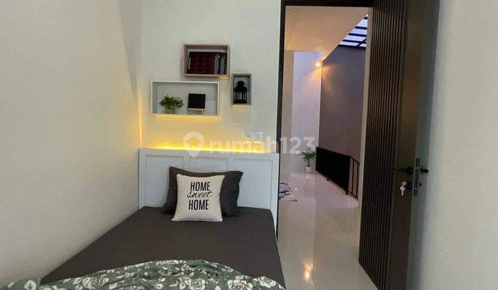 Rumah baru 2 lantai dekat kampus Unmer dan SMAK Santa Maria 9