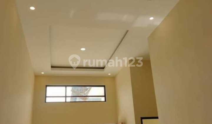 New 2-story house in Sawojajar, located near the main road.