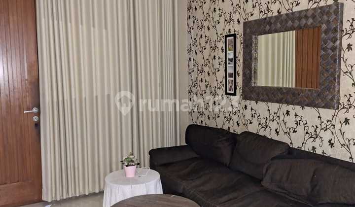 Semi-Furnished House with Wide Front Road in Graha Raya Bintaro 2
