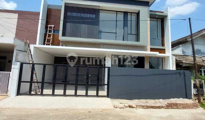 Rumah Modern Tropical Bebas Banjir di Bintaro Jaya Sektor 9