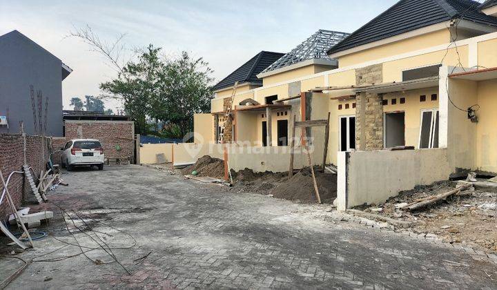 Rumah ready jalan lebar 3 mobil,400 meter jl woltermonginsidi 8