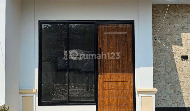 Rumah Eksklusif di Dalam Komplek yang Asri dan Nyaman 1