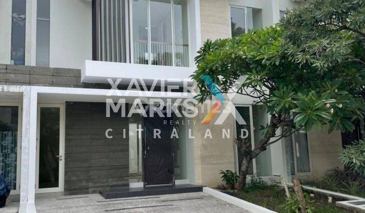 tampak depan rumah pelican hill, citraland, minimalis