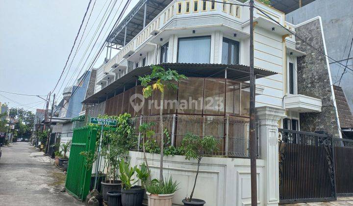 JUAL RUMAH HOEK SIAP HUNI, JALAN 2 MOBIL. 2