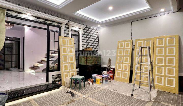 RUMAH MEWAH 3 LANTAI ROOFTOP DALAM CLUSTER DEKAT TOL ANDARA  2