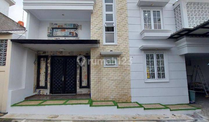 RUMAH MEWAH TOWNHOUSE DEKAT TOL DAN STASIUN KRL LENTENG AGUNG  1