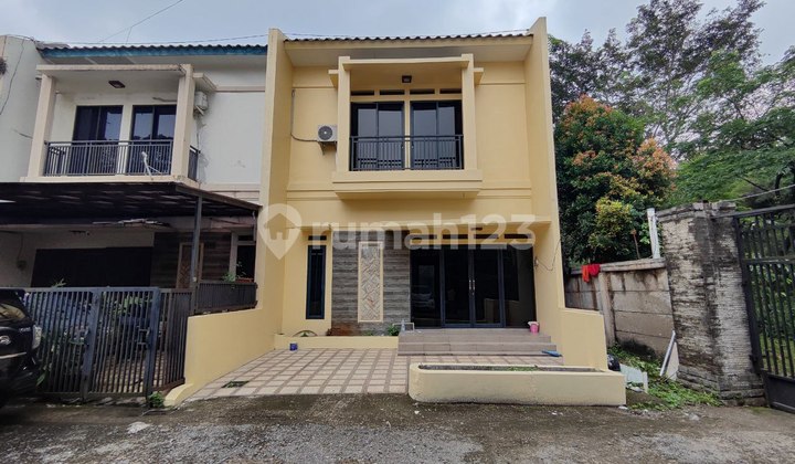 Cluster House with Large Land Near Main Road in Pancoran Mas DTC Depok 2