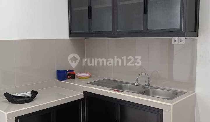 Newly Renovated Ready-to-Occupy House Close to Public Facilities in Sector 1.4 Griya Loka BSD.