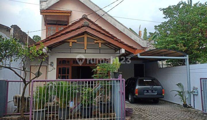 Rumah di Manukan G Walk Graha Natura Citraland 1