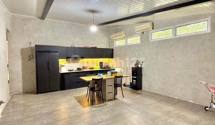 Affordable Minimalist Industrial Flood-Free House