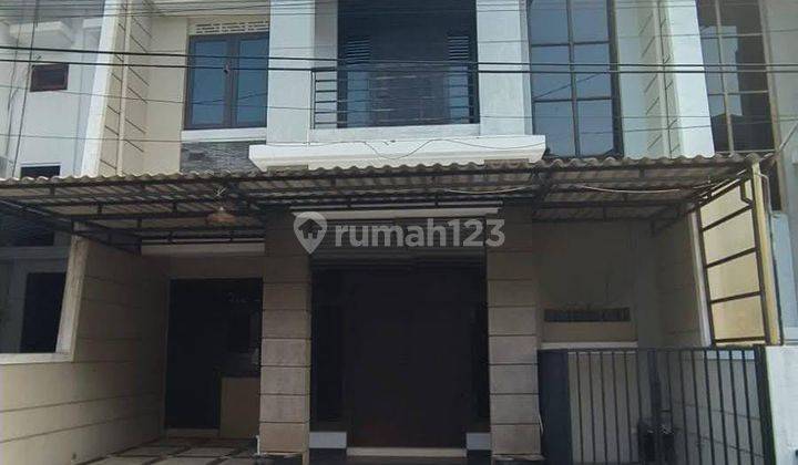 Rumah Di Manyar Tompotika 1