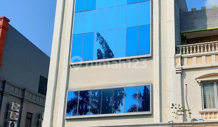 Ruko Gandeng Taman Surya 4 Lantai Mewah Rapi Siap Pakai