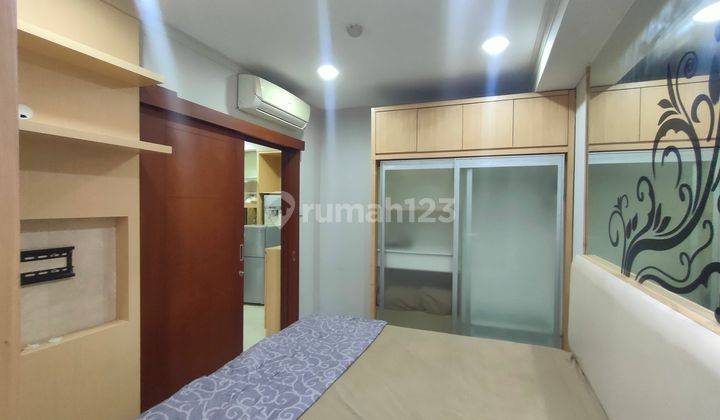 Royal Mediterania Garden 2 Kamar Tidur Furnished Bagus Lantai Rendah View kolam Harga Ok