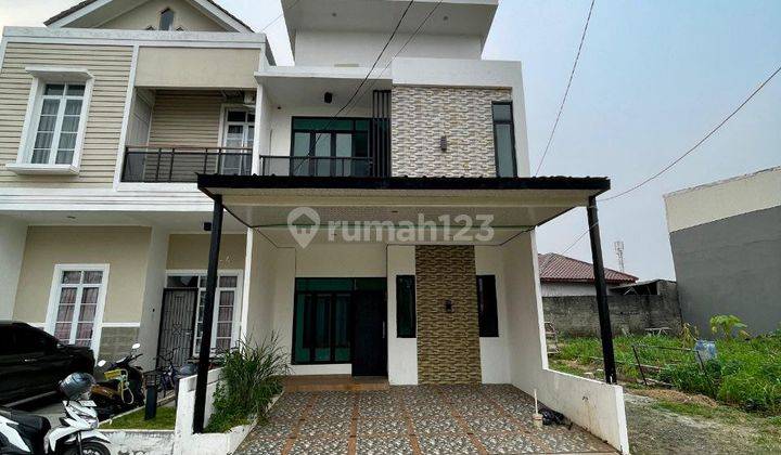 Rumah 2 Lantai siap huni dipondok gede Fasilitas Kolam Renang lokasi bebas banjir 1
