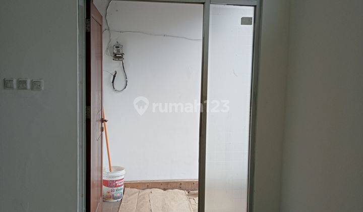 Rumah bisa ruko bisa tapi dalam komplek ya Deket sih ke jln raya  2