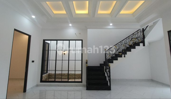 Rumah Lebar 9 Babatan Pantai Sudah Ada Range Golf dan Paddel Court Surabaya