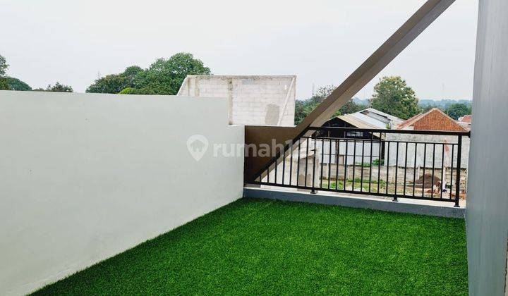 Rumah 2 Lantai Murah Plus Rooftop 21