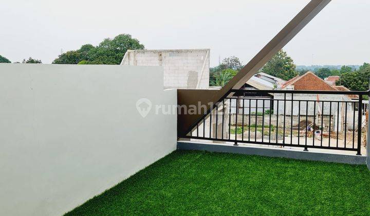 Rumah 2 Lantai 700jt an Dengan Rooftop Lengkap Fasilitas  1