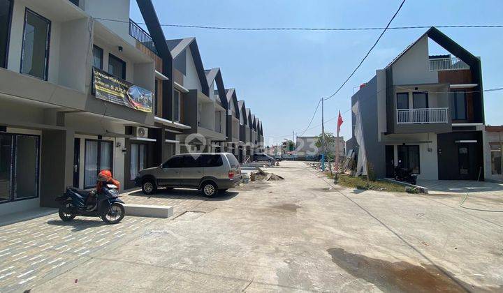 Rumah 2 Lantai Murah Plus Rooftop 15